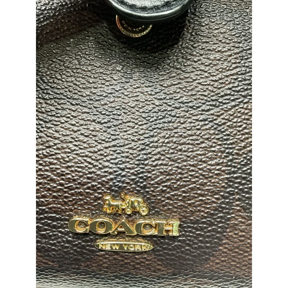 Coach signature one